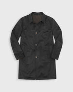 Load image into Gallery viewer, A dark charcoal gray cashmere reversible coat with a button-up front and collar, displayed flat against a light gray background.
