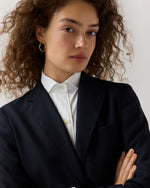 Load image into Gallery viewer, Wavy Hoop Earrings in Gold
