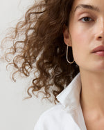 Load image into Gallery viewer, Oblong Open Hoop Earrings in Silver
