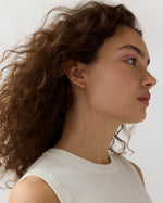 Load image into Gallery viewer, Tiny Sleeper Hoop Earrings in Gold
