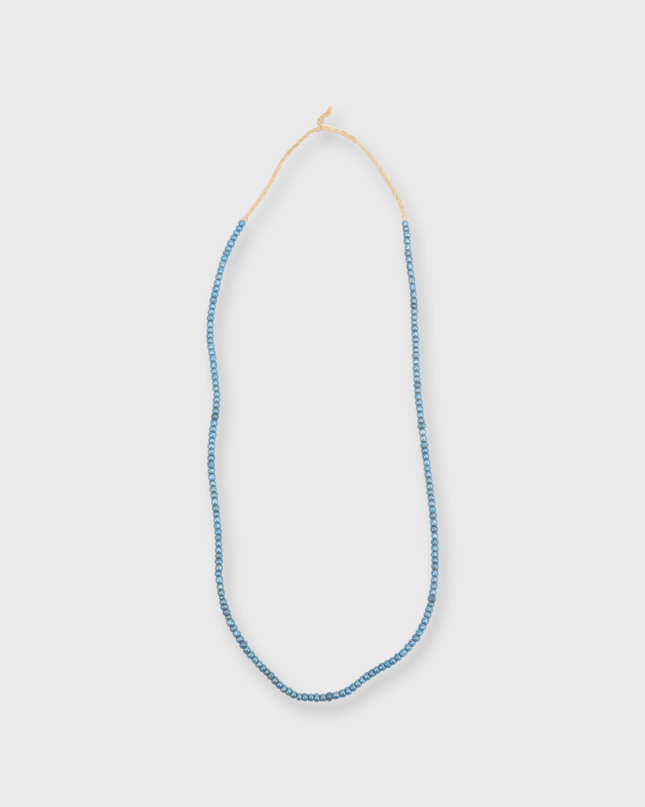 Tiny African Beads in Ocean